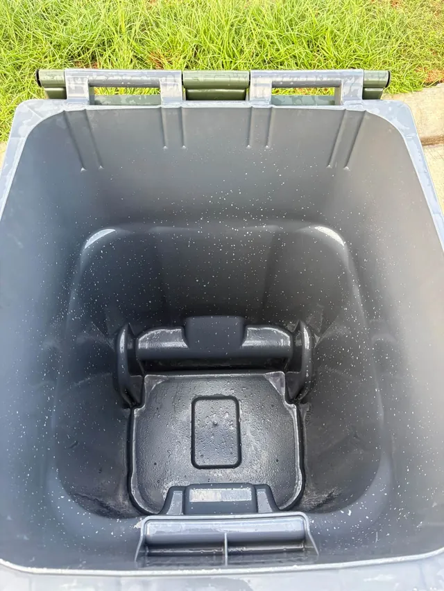 Clean gray trash can after washing
