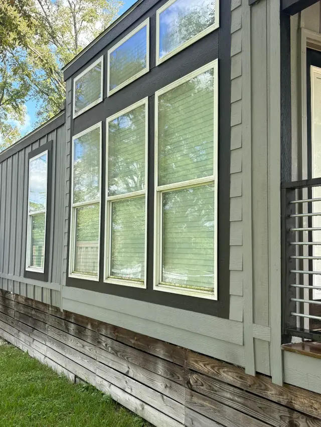 Window trim stained and dingy before washing